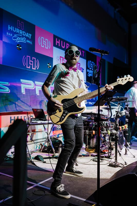 Band members grooving together during an upbeat number