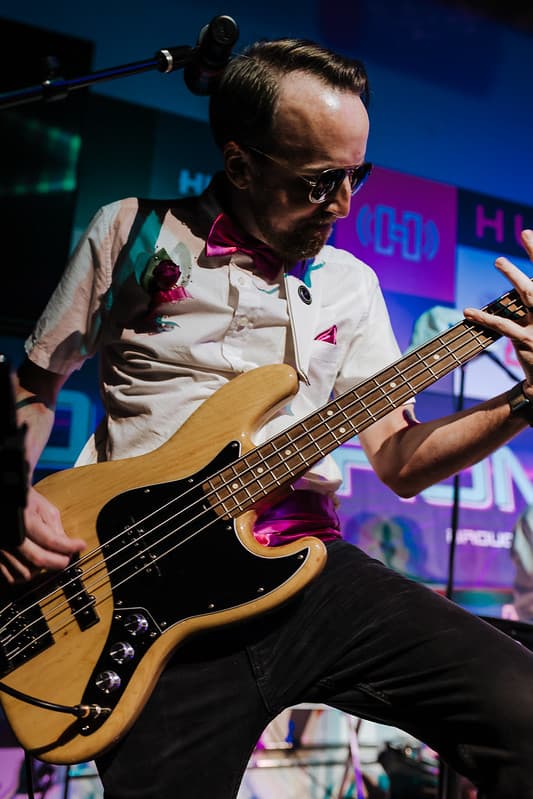 Intimate performance moment with soft stage lighting